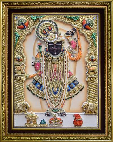 Majestic Image Of Shrinathji Amidst Golden Beads And Pillars Wallpaper