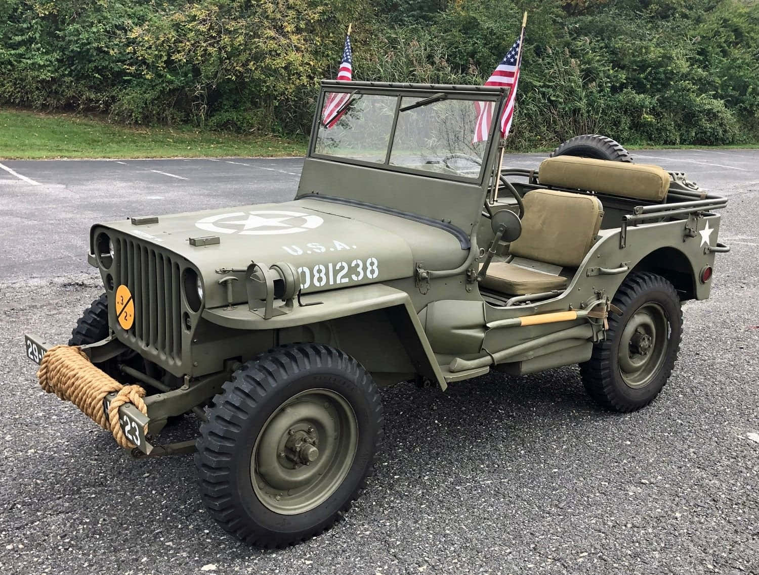 Majestic Jeep Willys In Natural Beauty Wallpaper