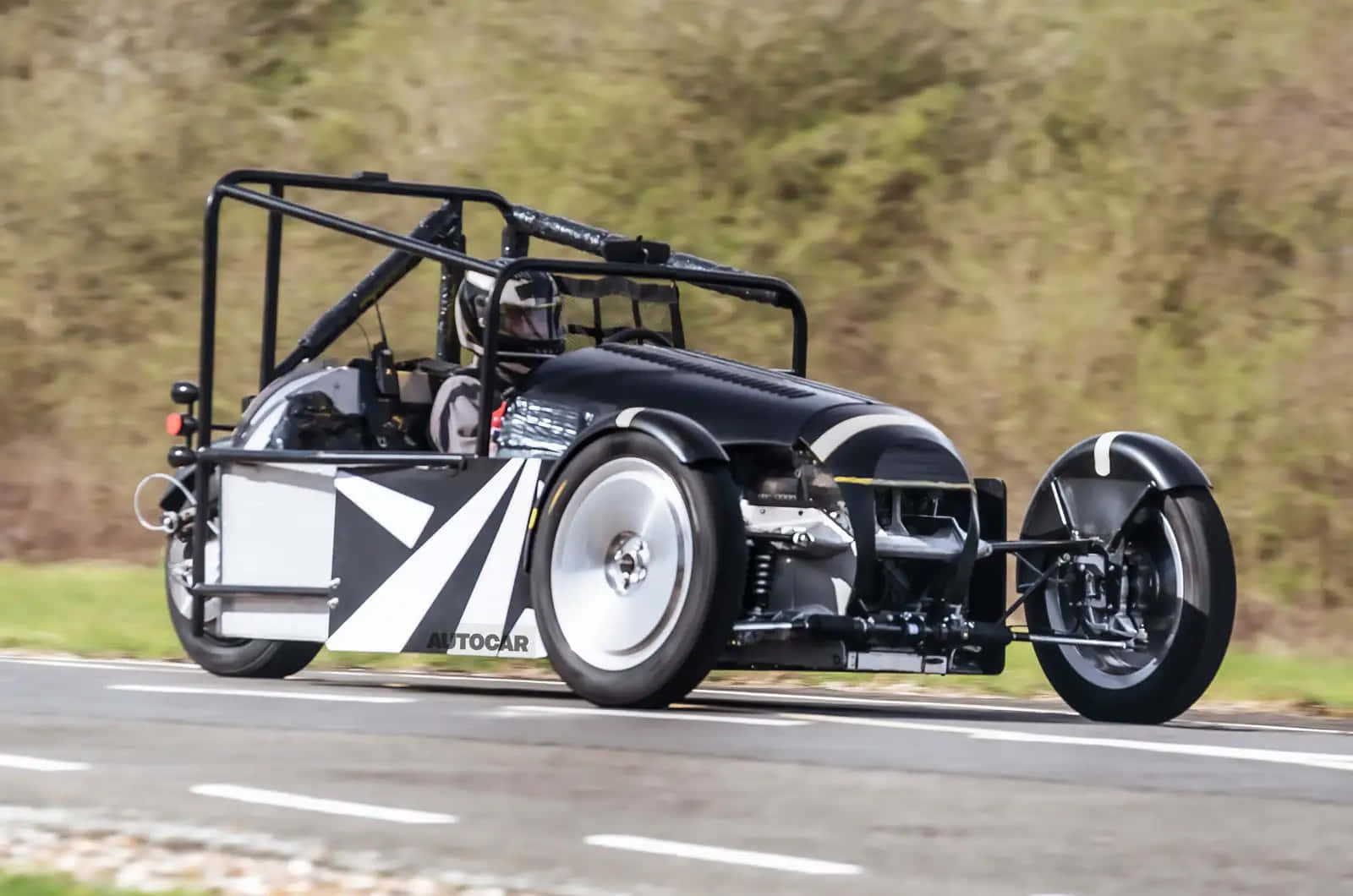 Majestic Morgan 3 Wheeler Dominating The Open Road Wallpaper