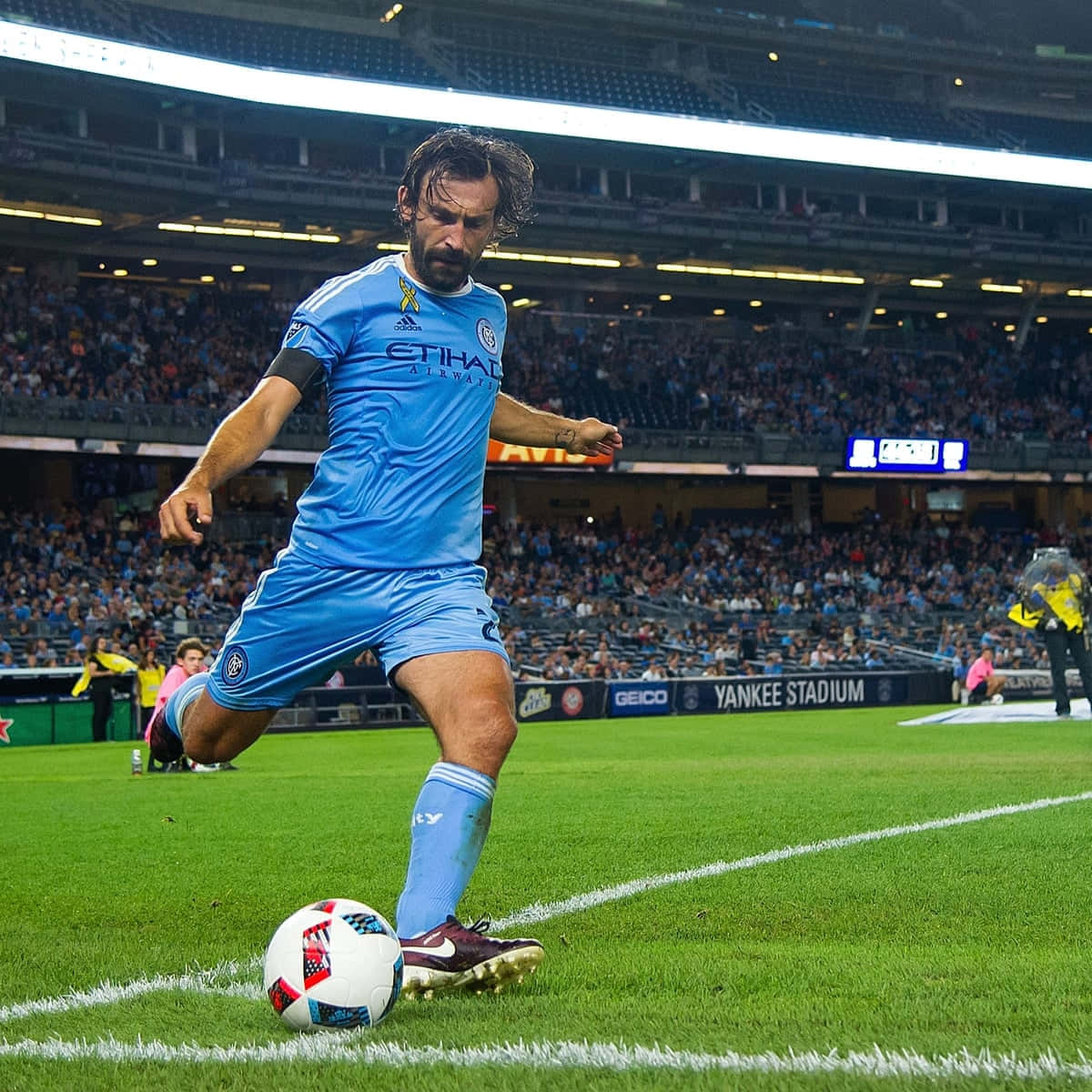 Majestic New York City Fc Star - Andrea Pirlo In Action Wallpaper