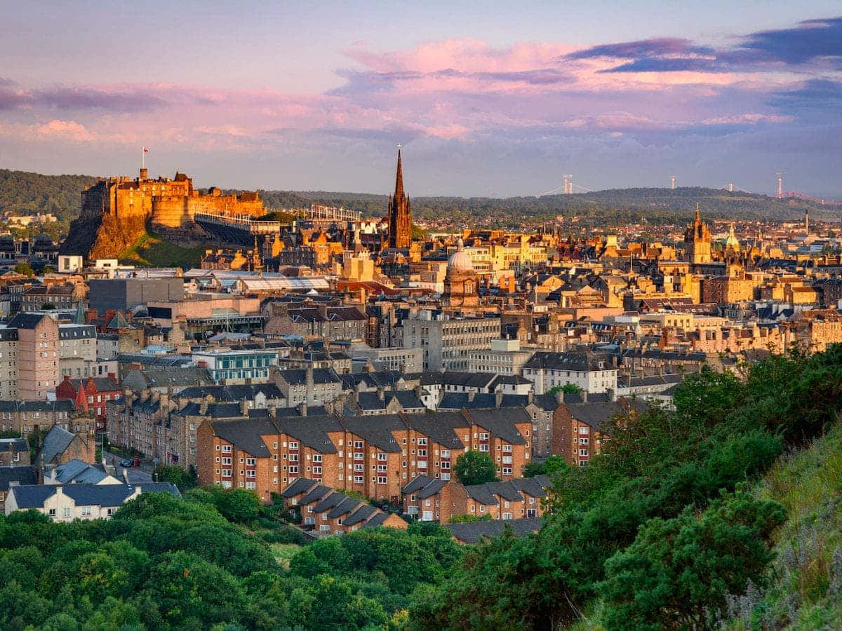 Majestic Panoramic View Of Edinburgh, Scotland Wallpaper