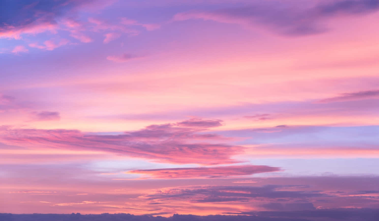 Majestic Pink Sky Above Tranquil Landscape Wallpaper