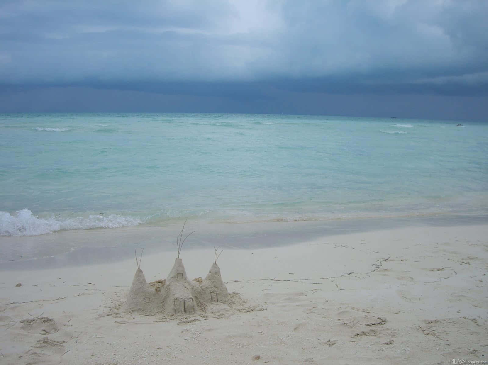 Majestic Sandcastle On Paradise Beach Wallpaper