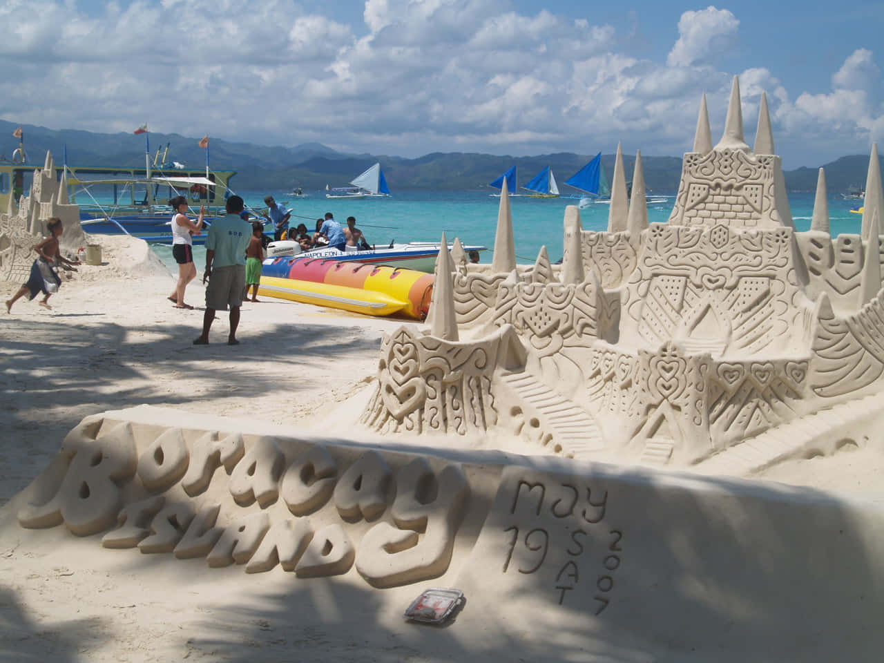 Majestic Sandcastle Standing Tall On A Beautiful Beach Wallpaper