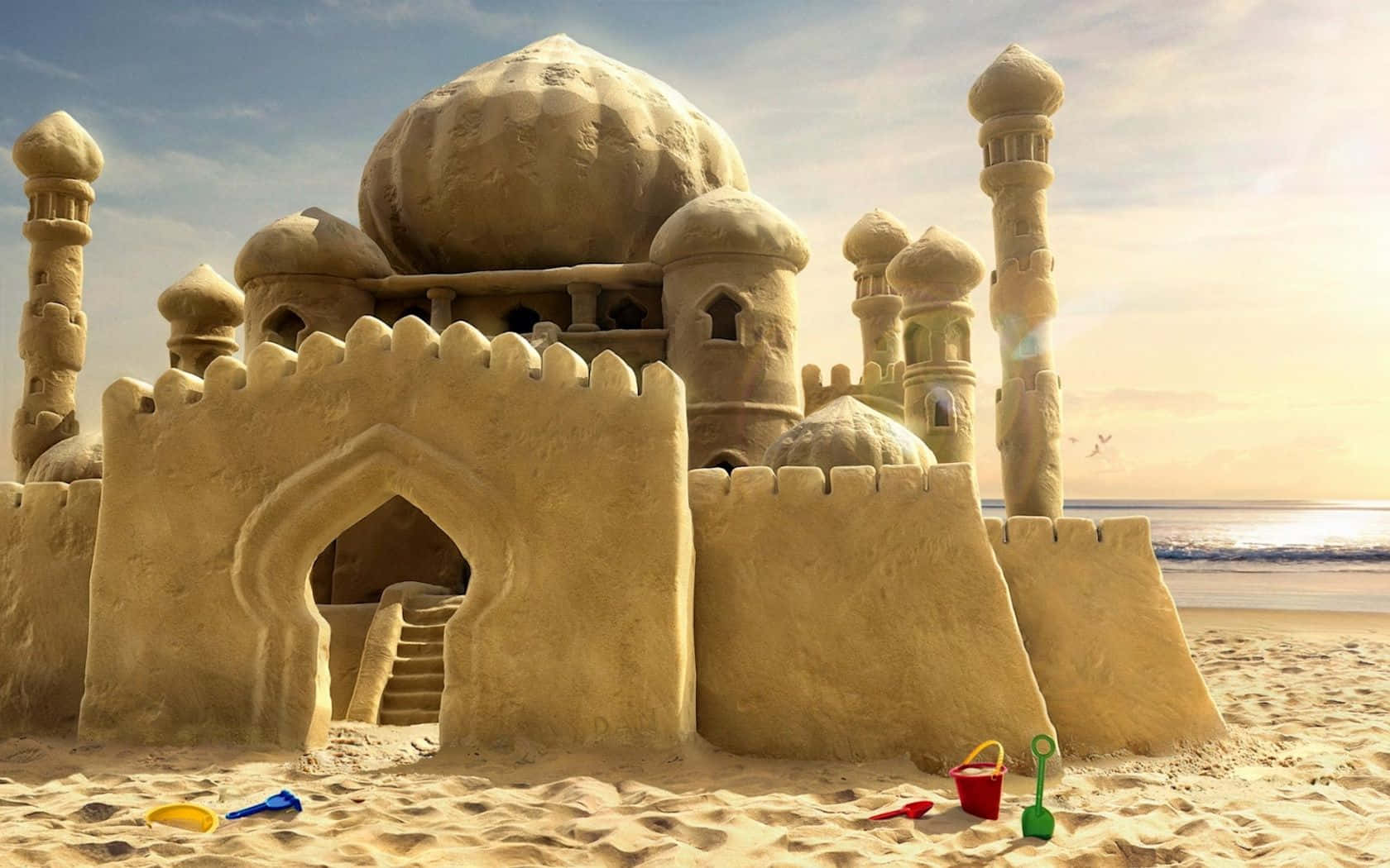 Majestic Sandcastles On A Sunny Beach Wallpaper