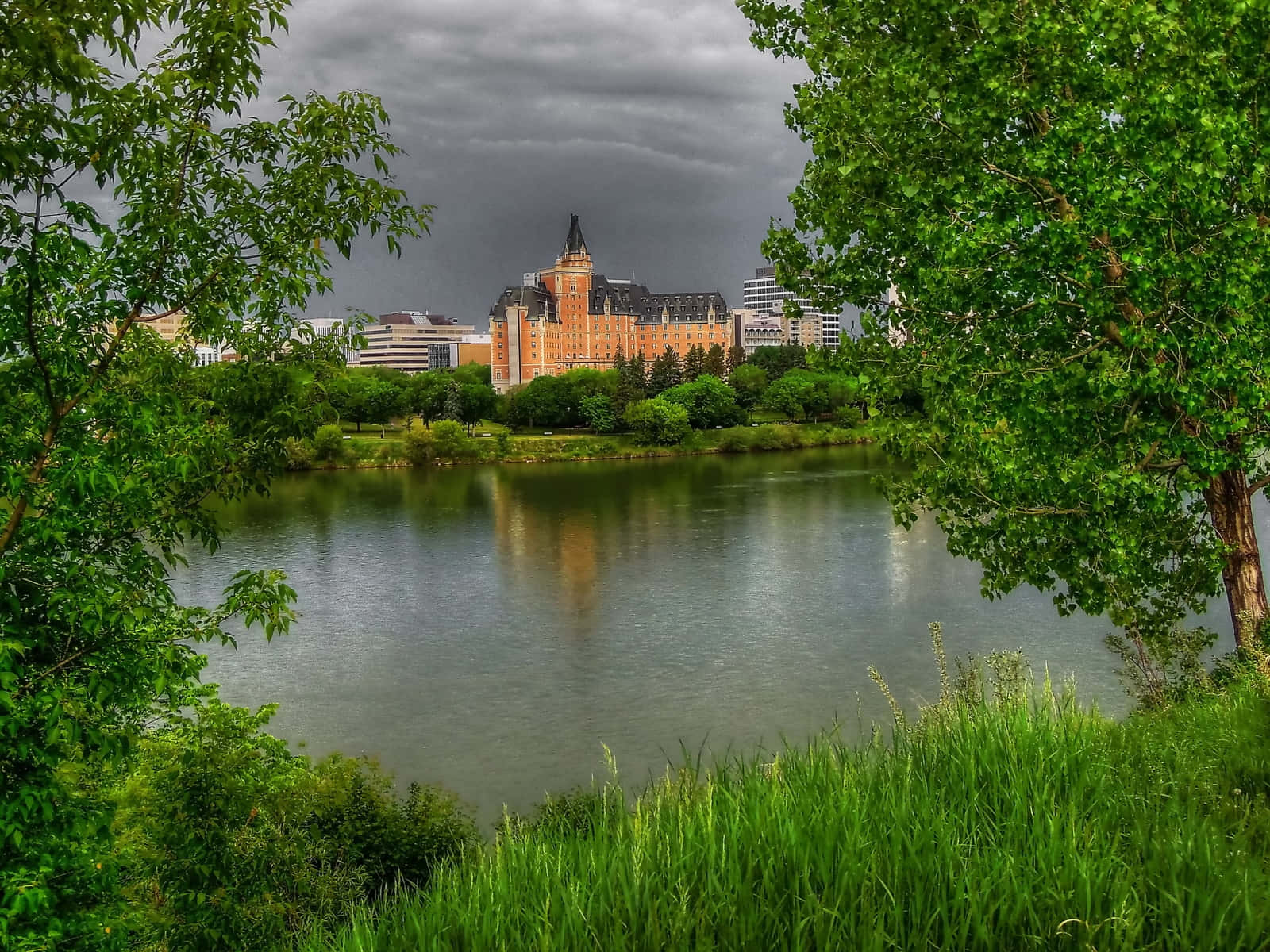 Majestic Skyline Of Downtown Saskatoon At Sunset Wallpaper