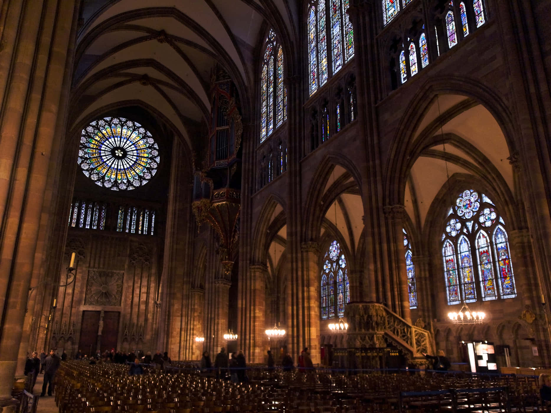 Majestic Strasbourg Cathedral Against Serene Sky Wallpaper