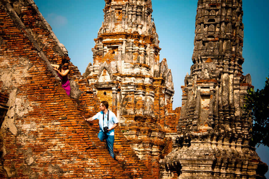 Majestic Sunset Over The Ancient Ruins Of Ayutthaya Historical Park, Thailand Wallpaper