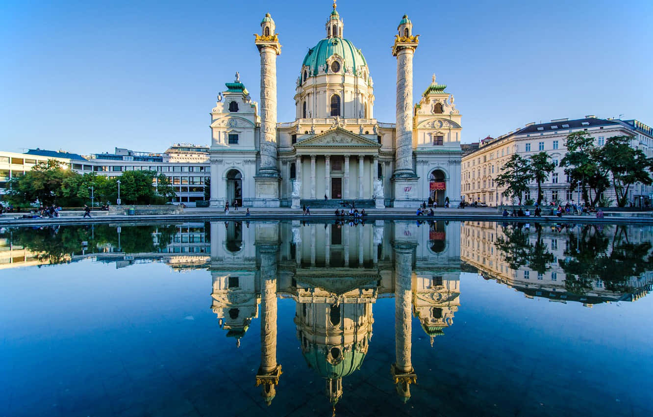 Majestic Vienna Cathedral Under Blue Sky. Wallpaper