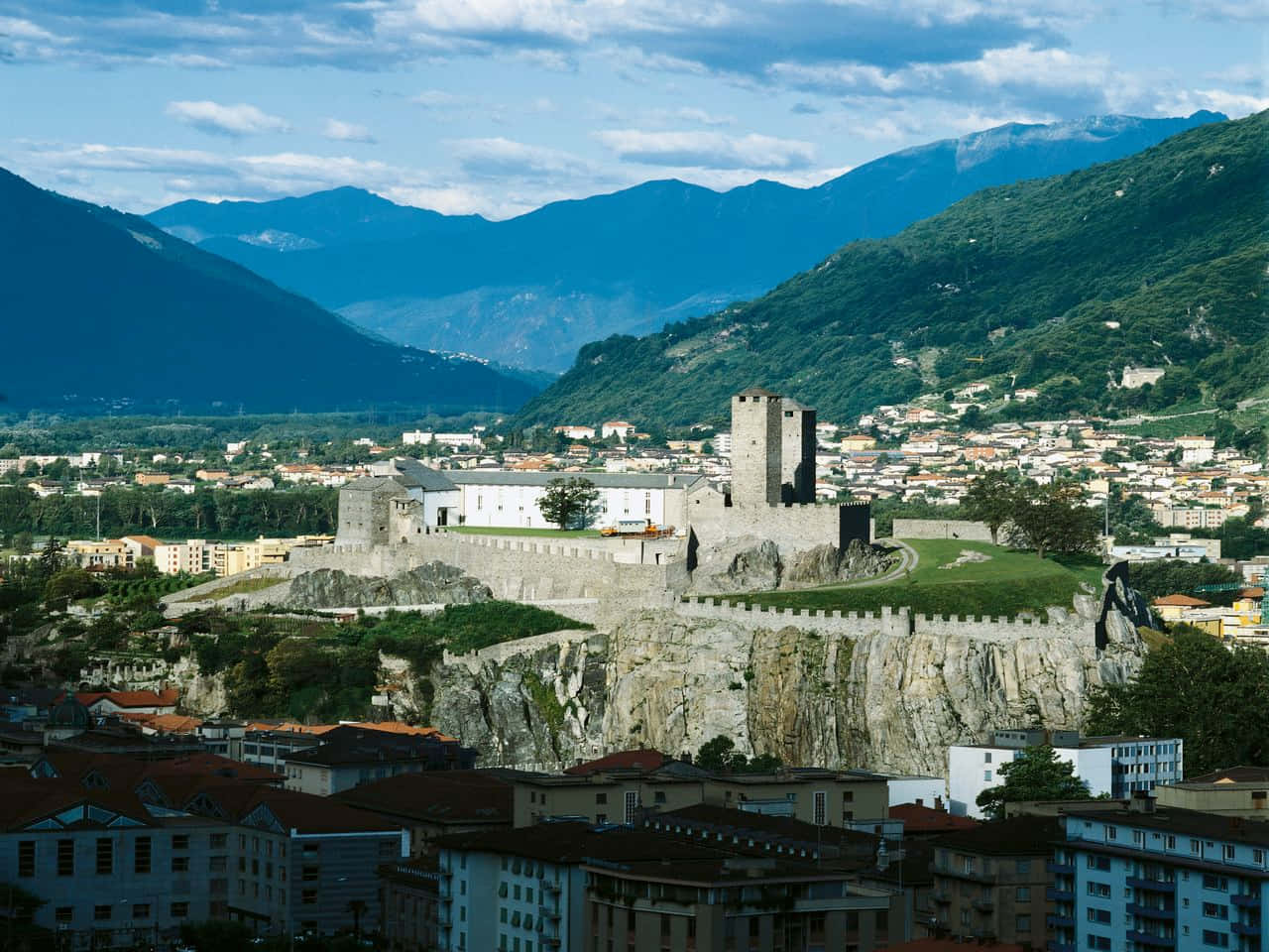 Majestic View Of Bellinzona Castles In Switzerland Wallpaper