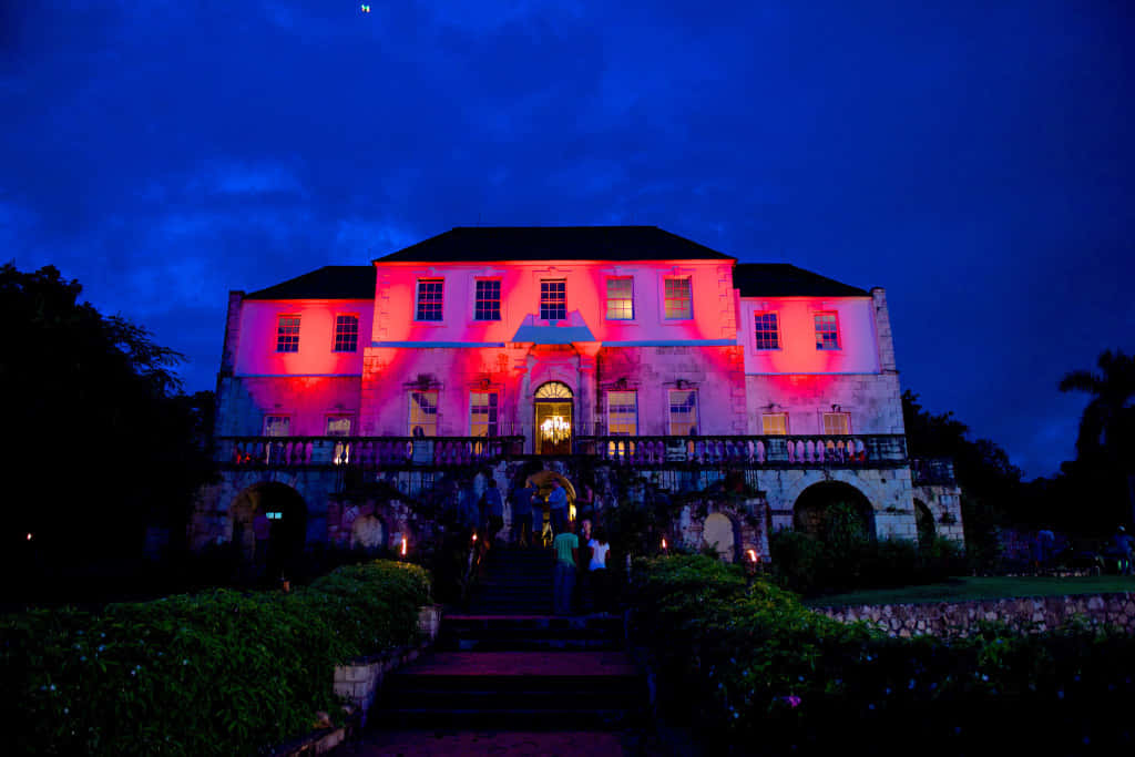 Majestic View Of Rose Hall Great House Under The Blue Evening Sky Wallpaper