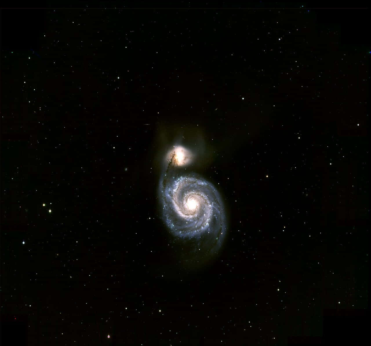 Majestic Whirlpool Galaxy Spiral In Deep Space Wallpaper