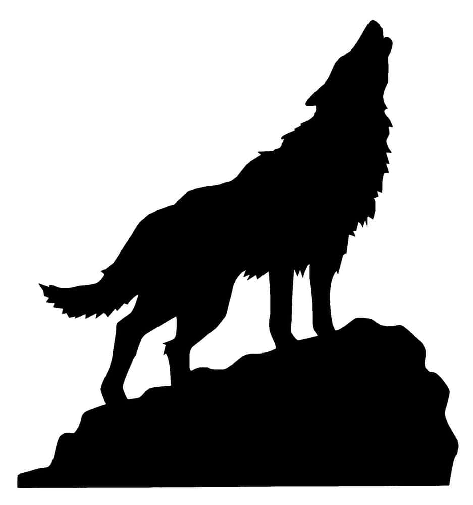 Majestic Wolf Silhouette Against A Moonlit Sky Wallpaper