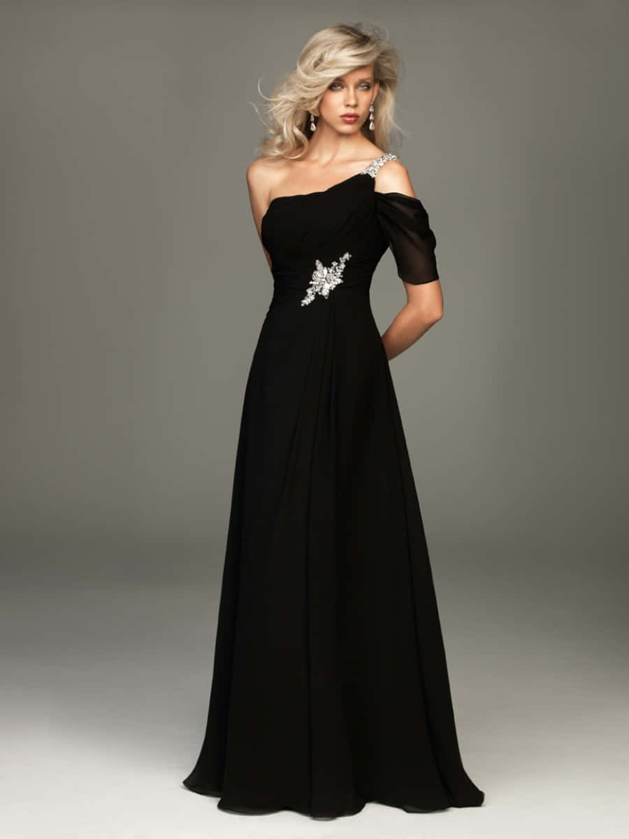 Make A Lasting Impression With This Elegant Black Tie Dress. Wallpaper