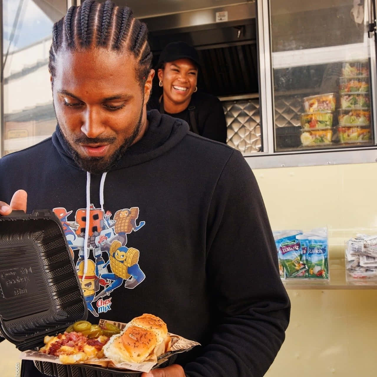 Man Enjoying Food Truck Meal Wallpaper