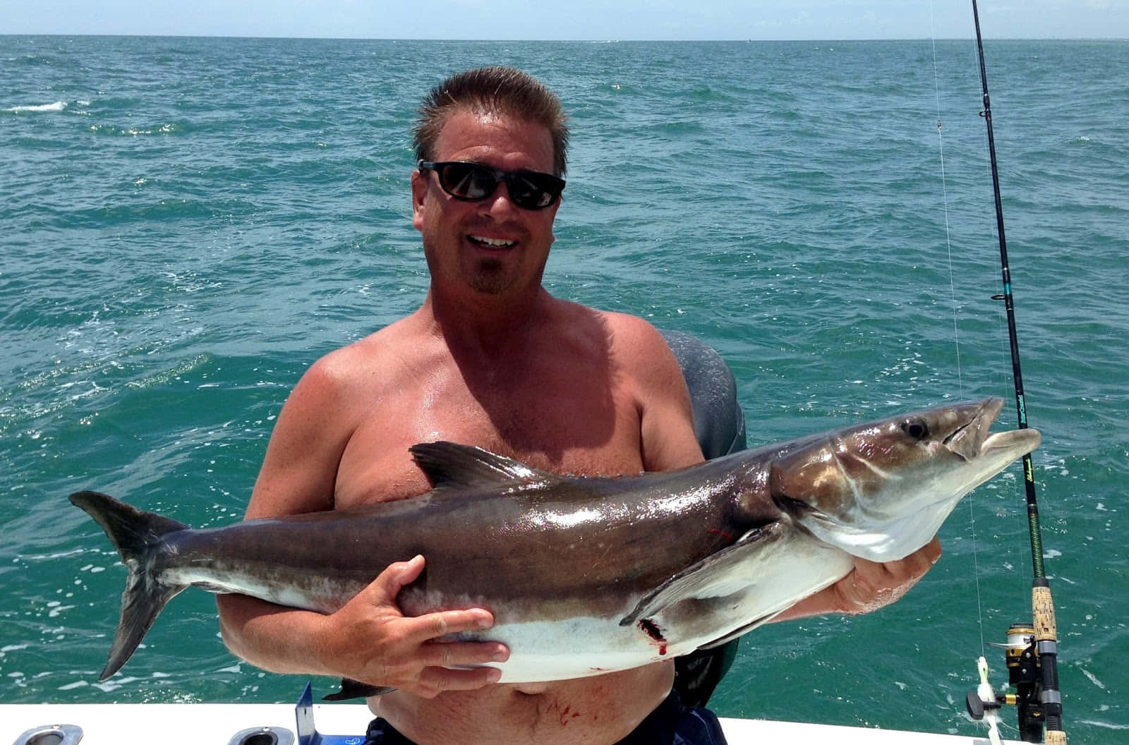 Man Holding Caught Cobia Fish Wallpaper