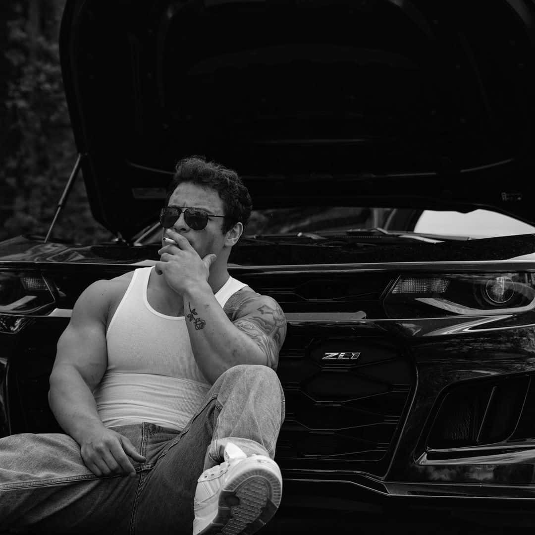 Man Smoking Beside Camaro Z L1 Wallpaper