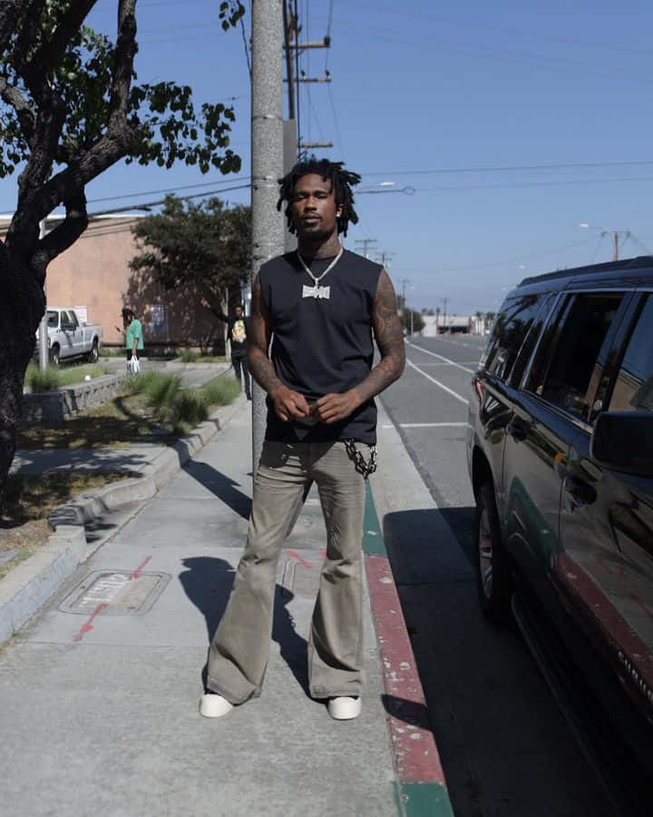 Man Standing Near Roadside Wallpaper