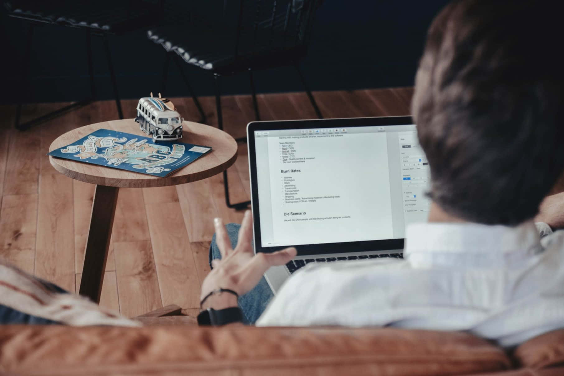 Man Workingon Laptop From Home Wallpaper