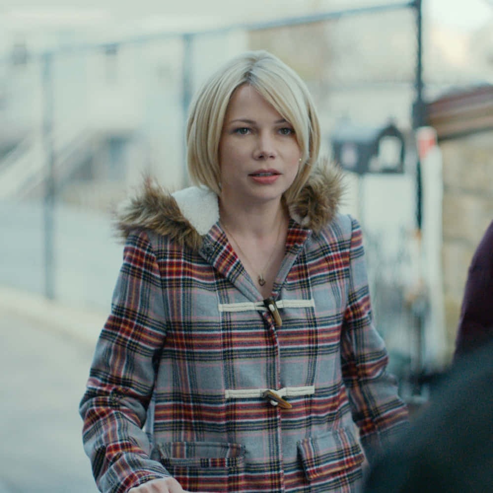 Manchester By The Sea Concerned Woman Scene Wallpaper