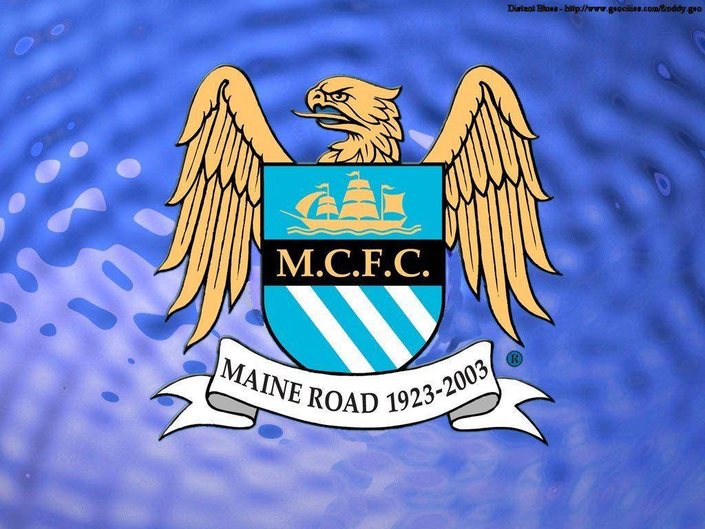 Manchester City Fc Logo Over Textured Blue Background Wallpaper