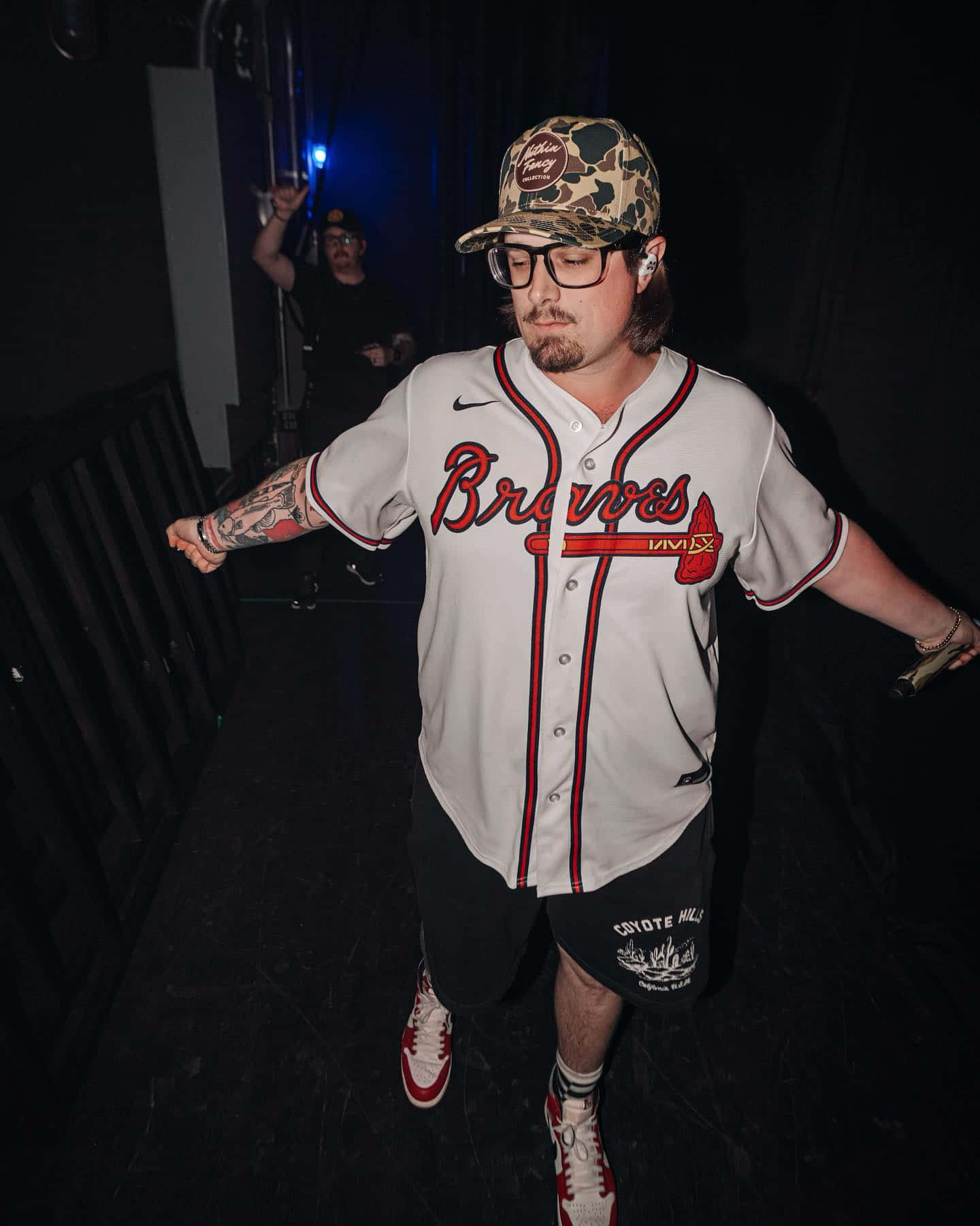 Manin Baseball Jersey Walking Backstage Wallpaper