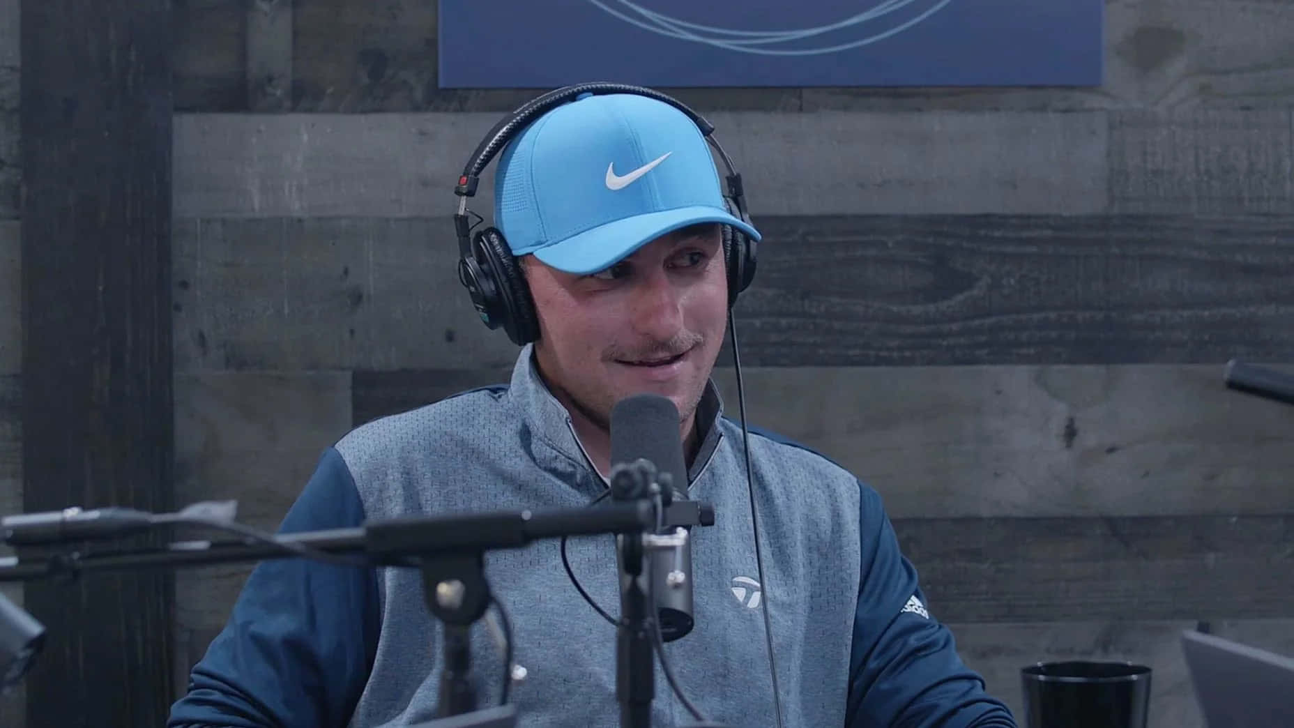 Manin Nike Cap Podcast Session Wallpaper