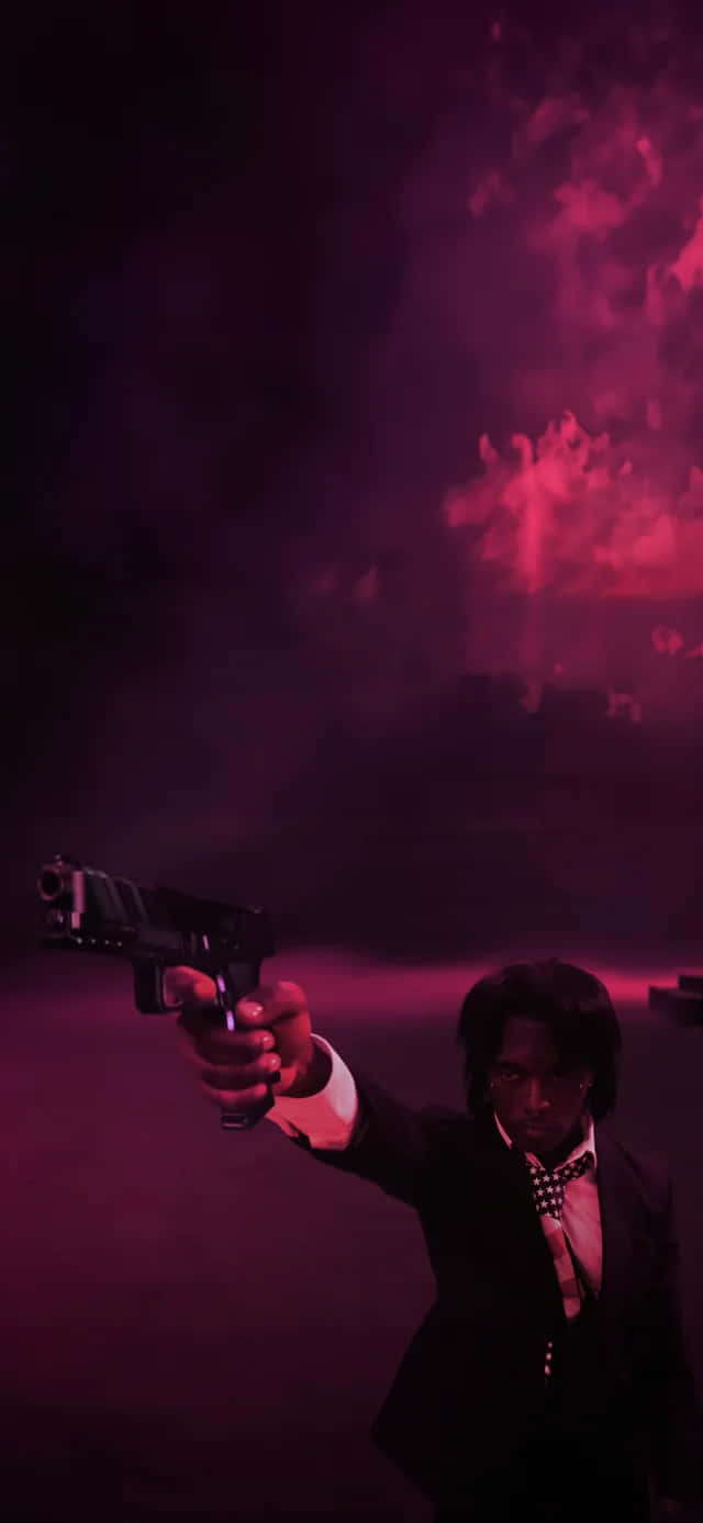 Manin Pink Haze Holding Gun Wallpaper