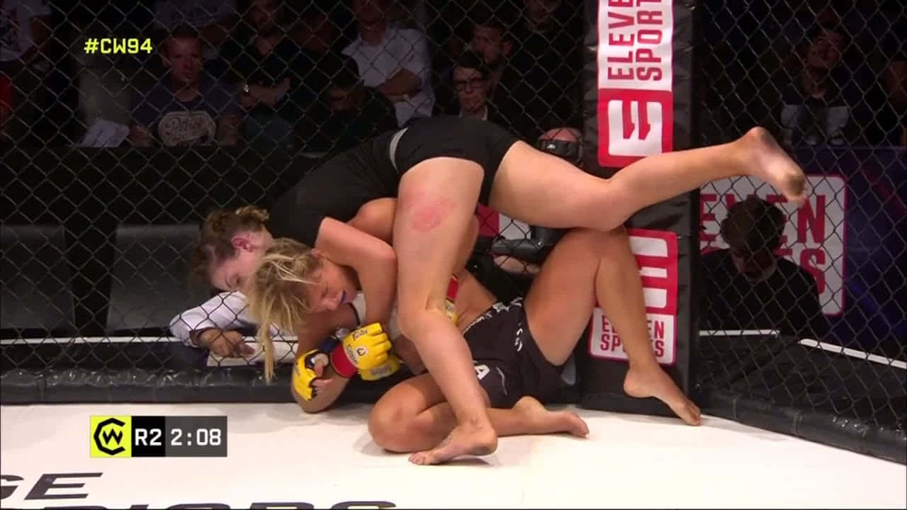 Manon Fiorot In Action During A Ufc Fight Wallpaper