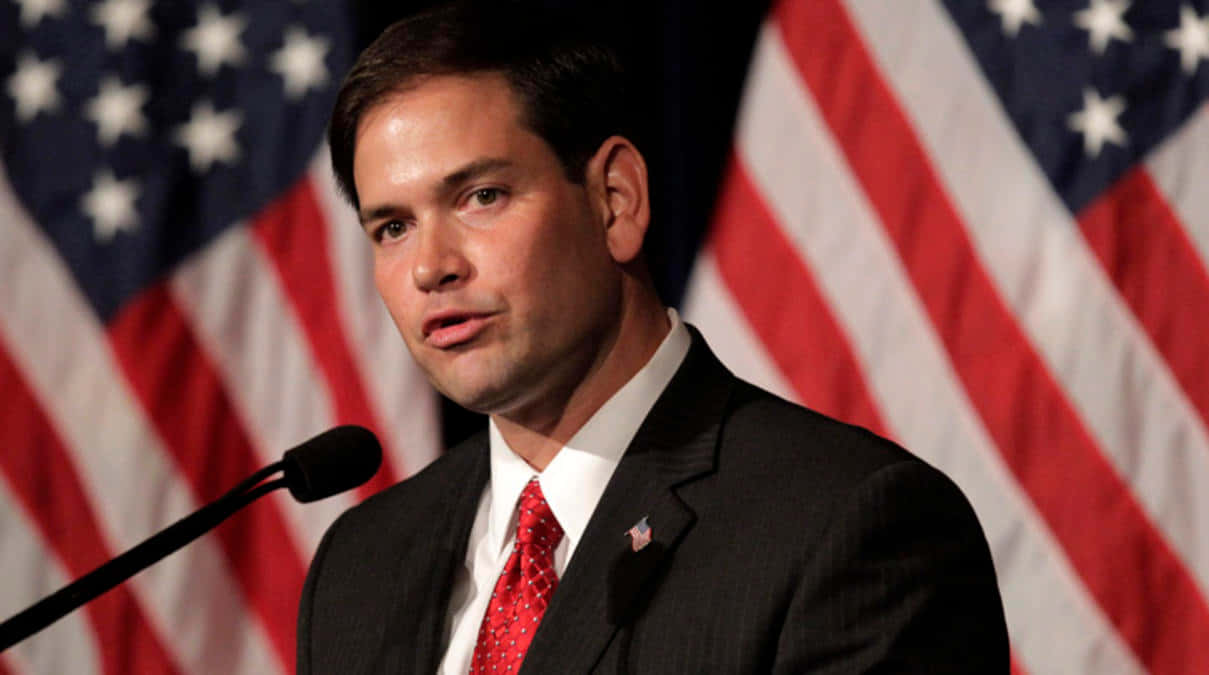 Marco Rubio With Usa Flag Wallpaper