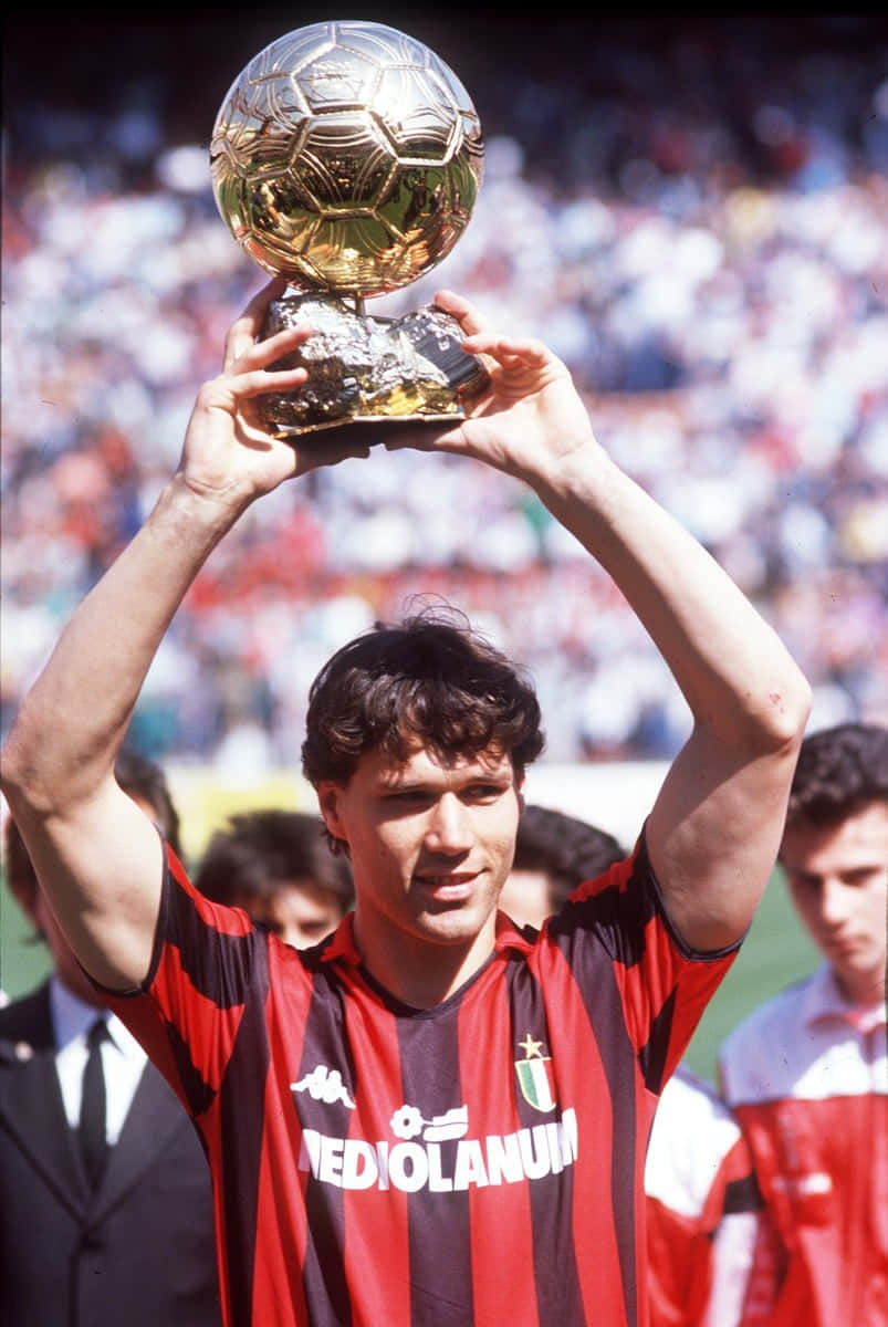 Marco Van Basten Joyfully Lifting A Trophy Wallpaper