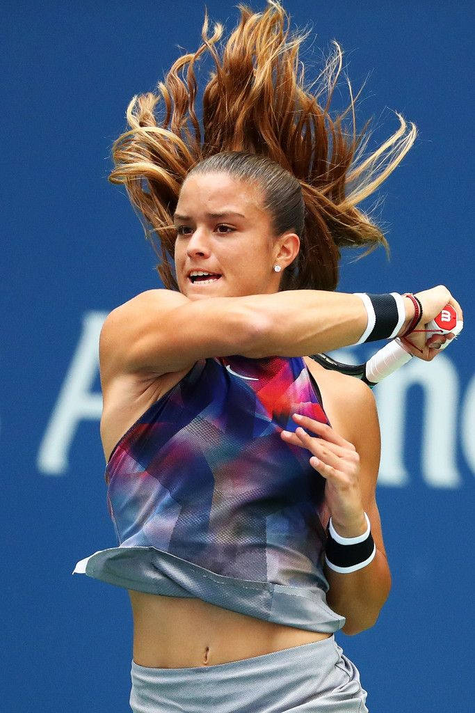 Maria Sakkari In Action With Hair Flying Wallpaper