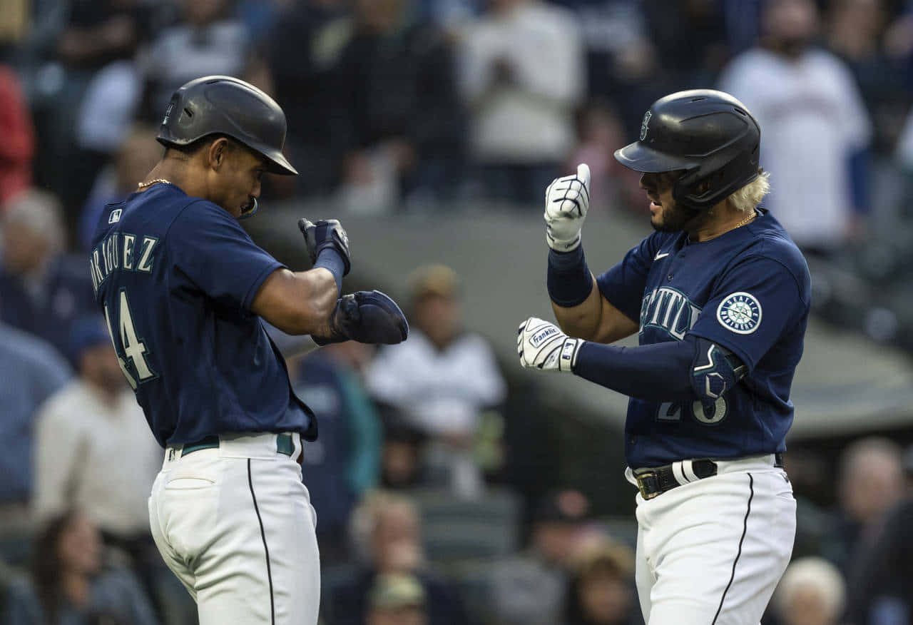 Mariners Celebratory Fist Bump Wallpaper