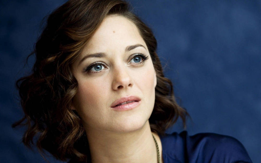 Marion Cotillard Mesmerizing In Blue Wallpaper