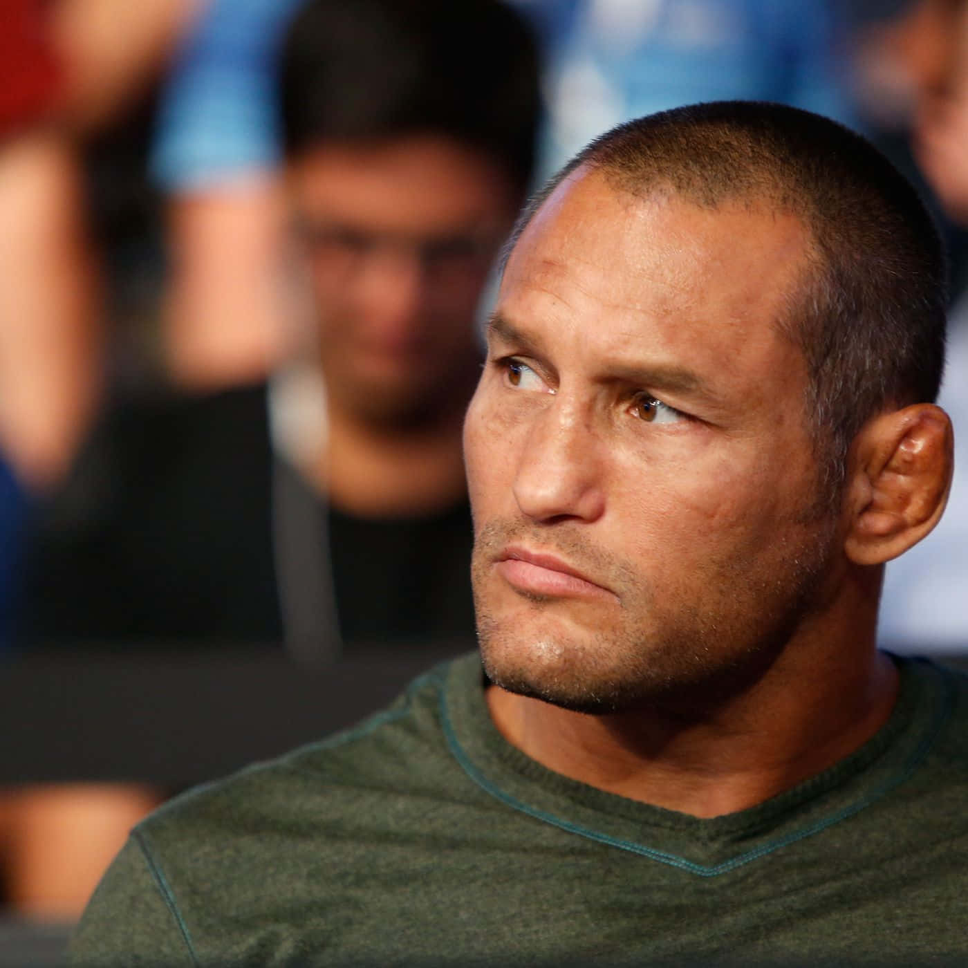 Martial Artist Dan Henderson Watching A Fight Wallpaper