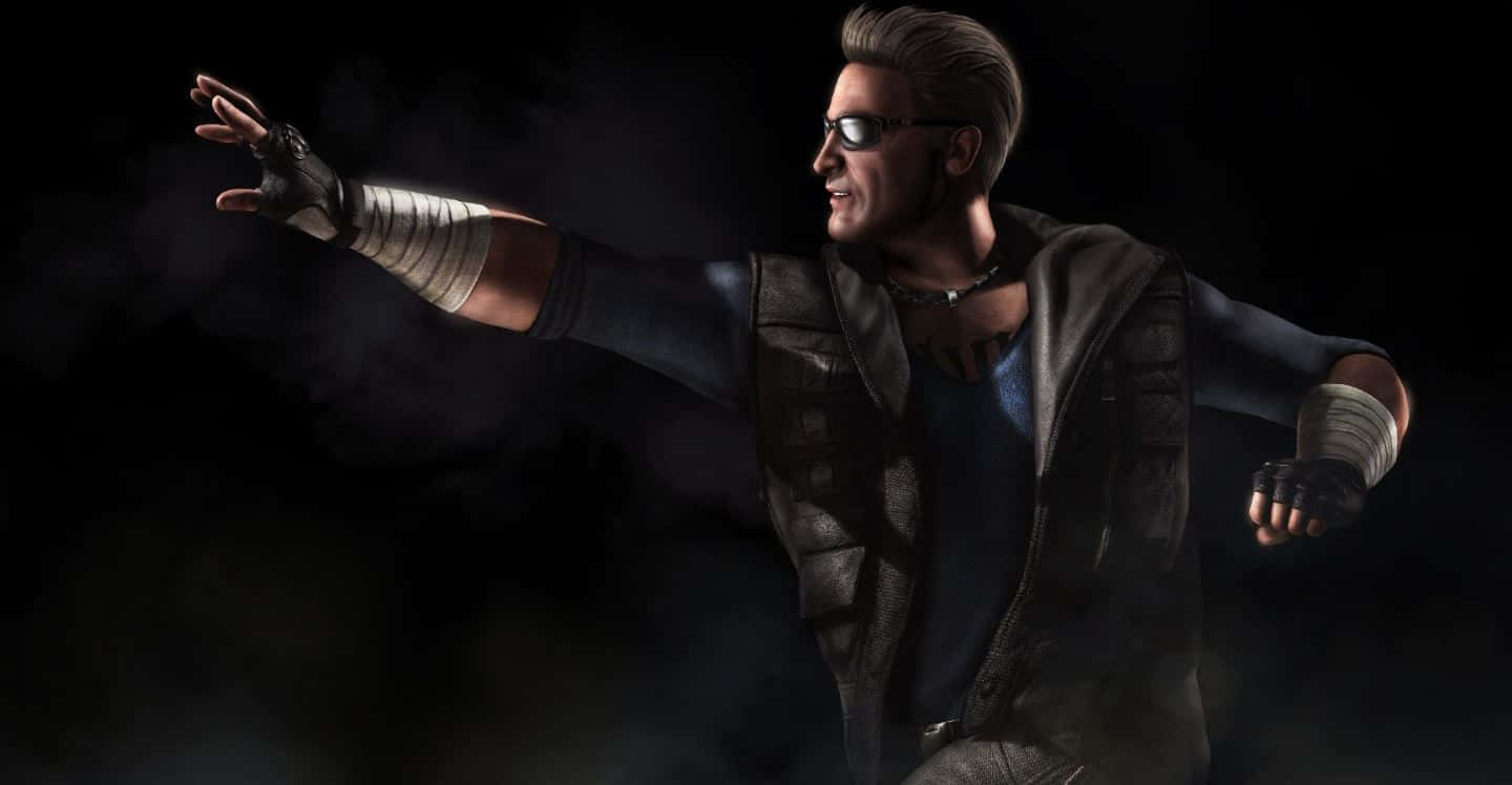 Martial Arts Master Johnny Cage Unleashing Power In Mortal Kombat Wallpaper