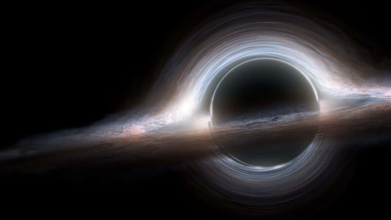 Marvel At The Beauty Of The Interstellar Black Hole Wallpaper