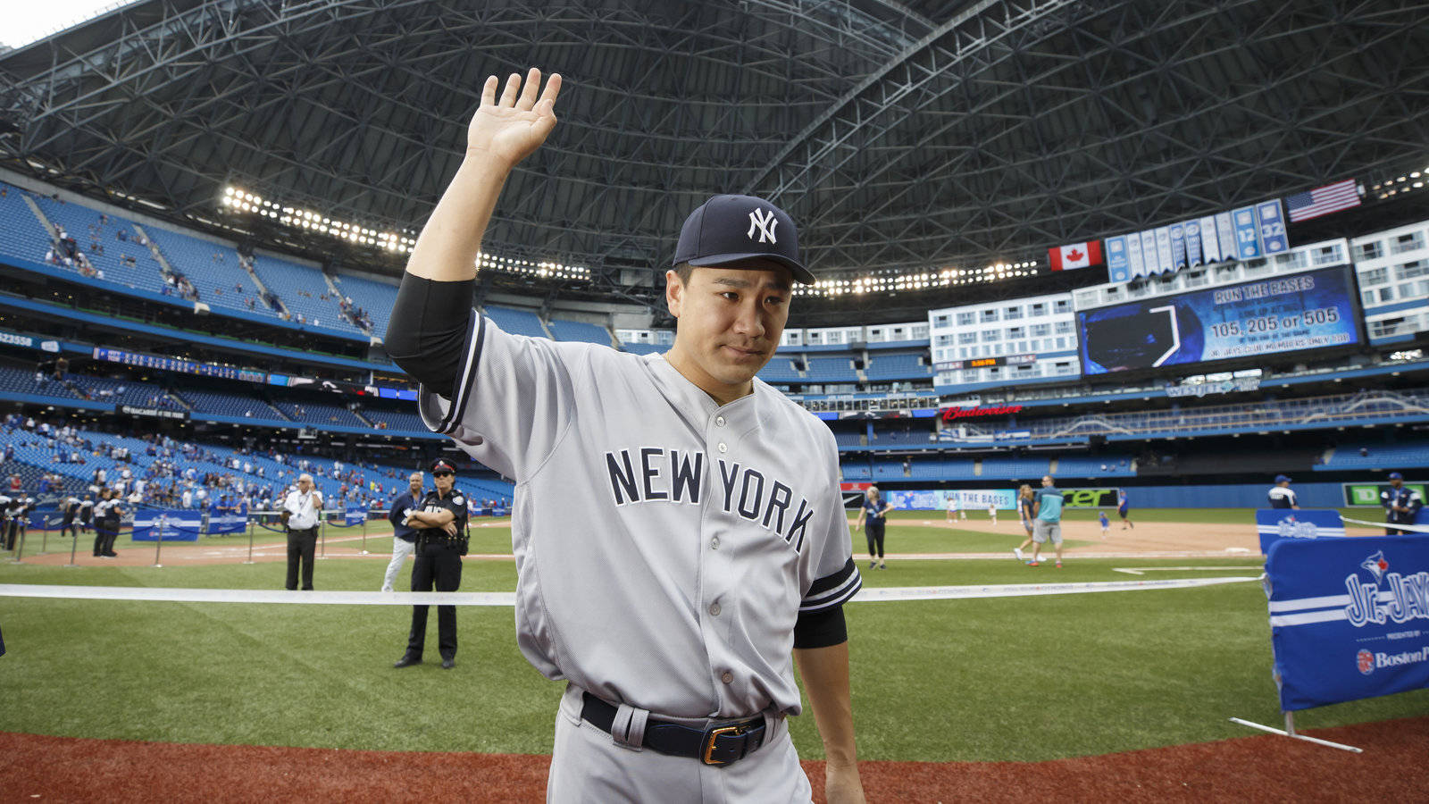 Masahiro Tanaka Waving In Stadium Wallpaper