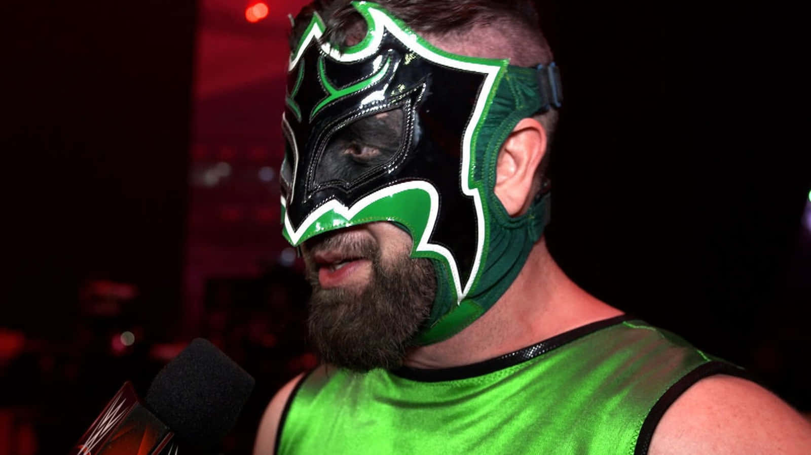 Masked Wrestler Green Attire Wallpaper