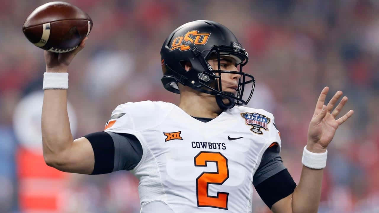 Mason Rudolph O S U Quarterback Action Wallpaper