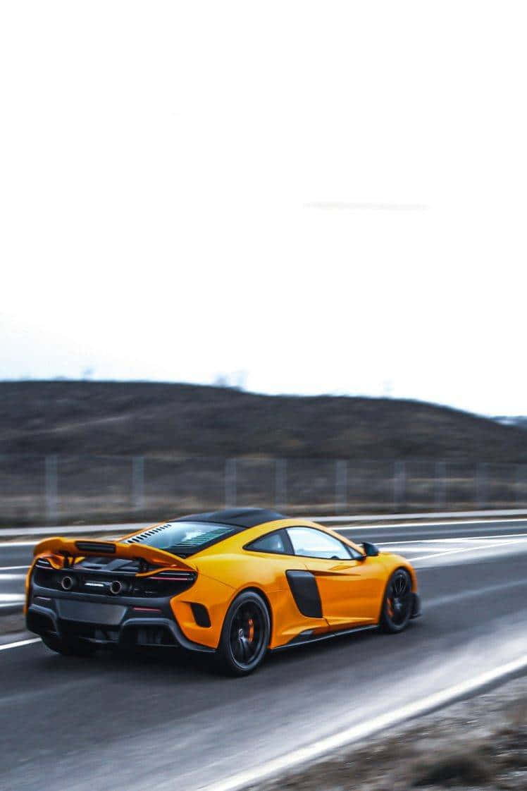 Master Of Speed - Mclaren 675lt In Full Glory Wallpaper