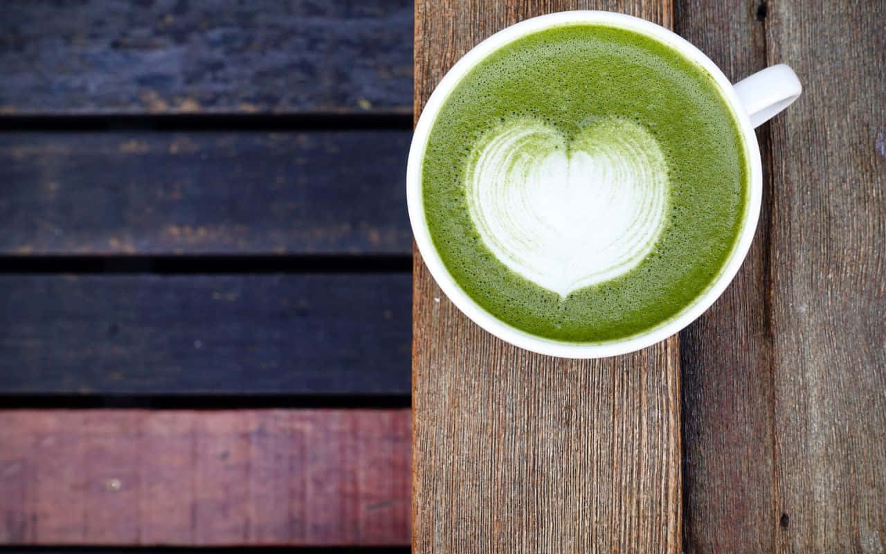 Matcha Latte Art Heart Top View Wallpaper