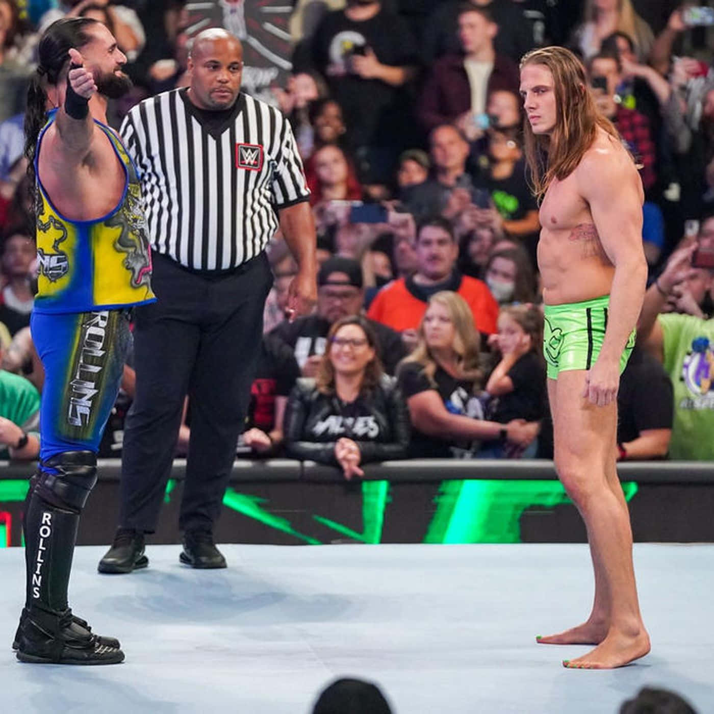 Matt Riddle Versus Seth Rollins Wallpaper