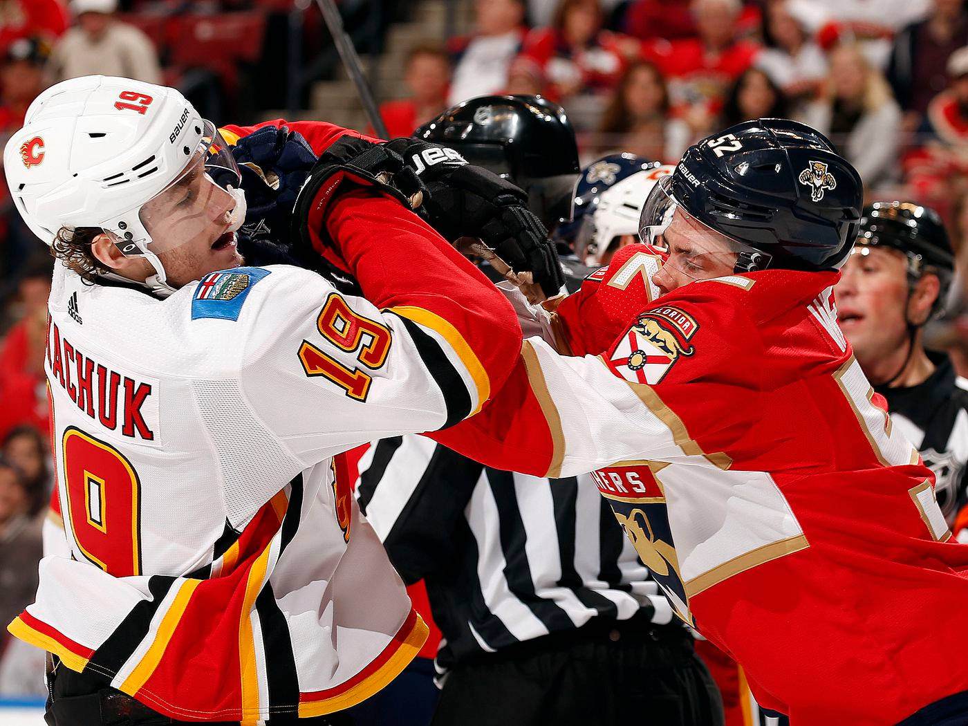 Matthew Tkachuk In Action During A Hockey Game. Wallpaper