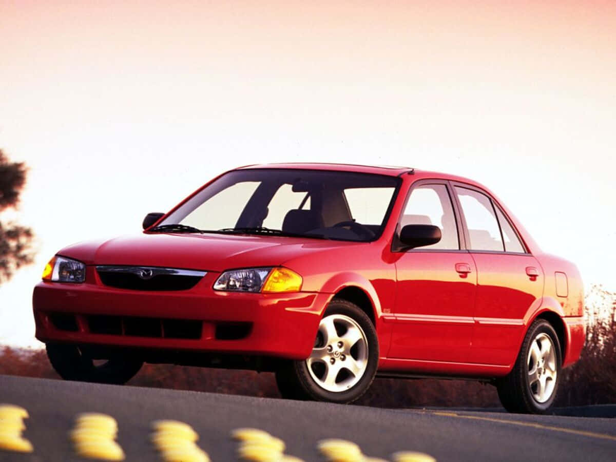 Mazda Protege: A Stylish And Reliable Sedan Wallpaper