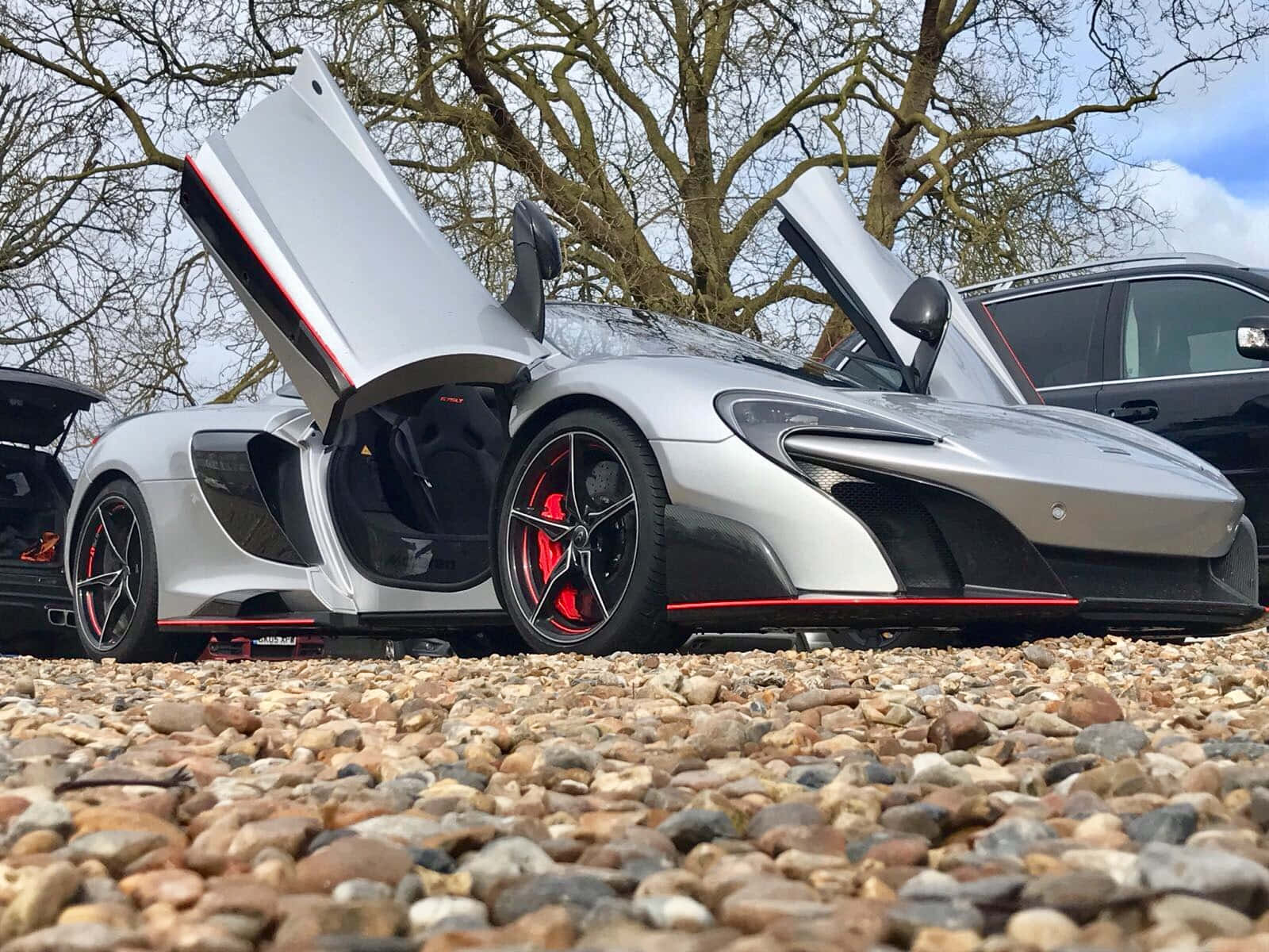 Mclaren 675lt Spider Showcasing Its Stunning Design And Power Wallpaper