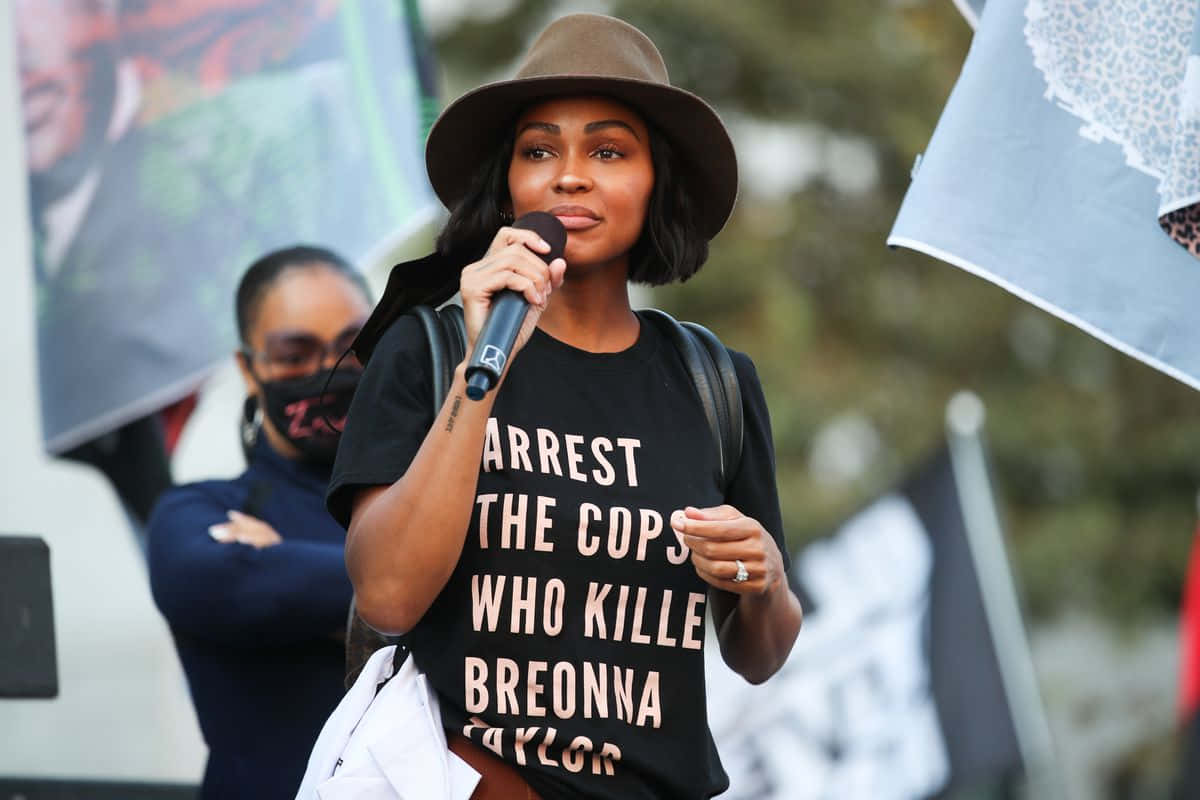 Meagan Good Speakingat Protest Event Wallpaper