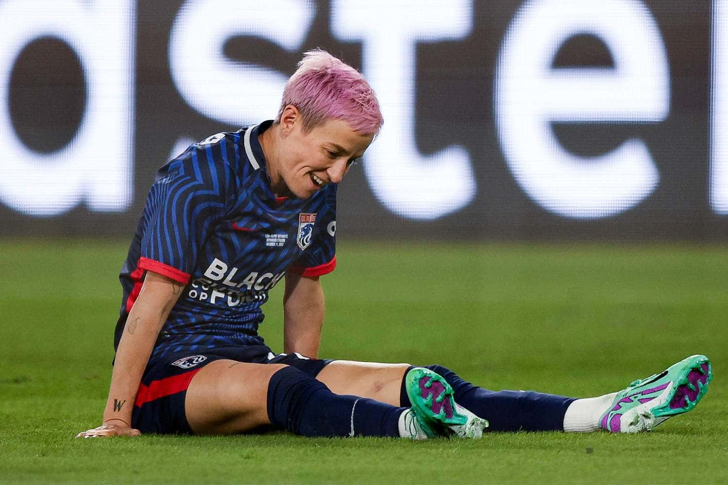 Megan Rapinoe Soccer Field Moment Wallpaper