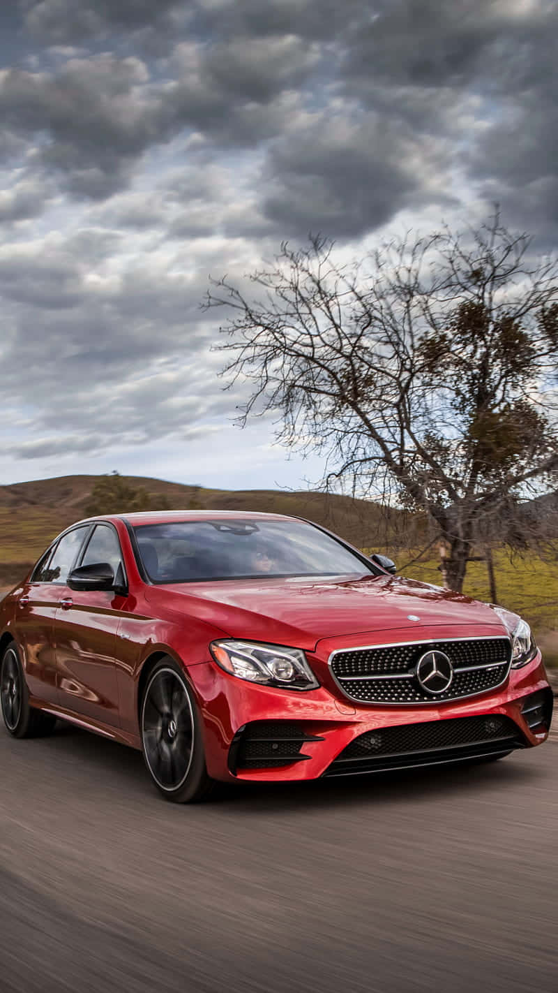 Mercedes Benz Clase E Under A Dark Sky Wallpaper