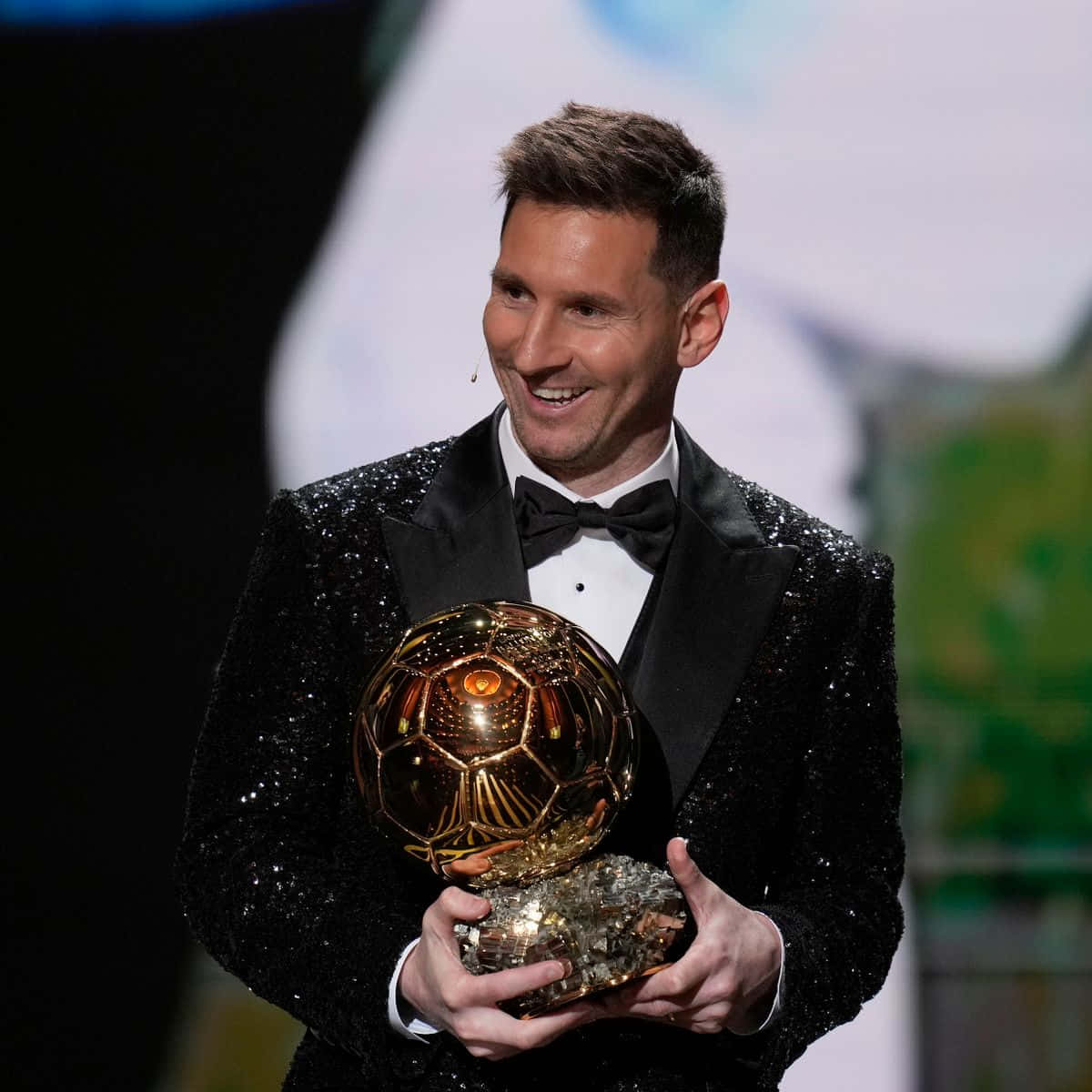 Messi Holding Ballon Dor Award Wallpaper